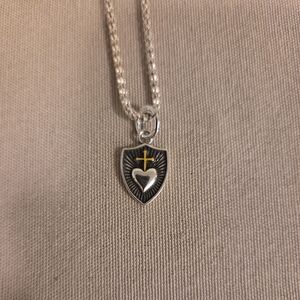 Silver Shield Pendant Necklace with Yellow Cross Accent
